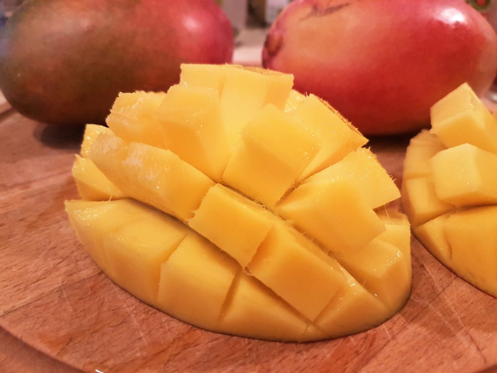 Peeling and cutting the mango