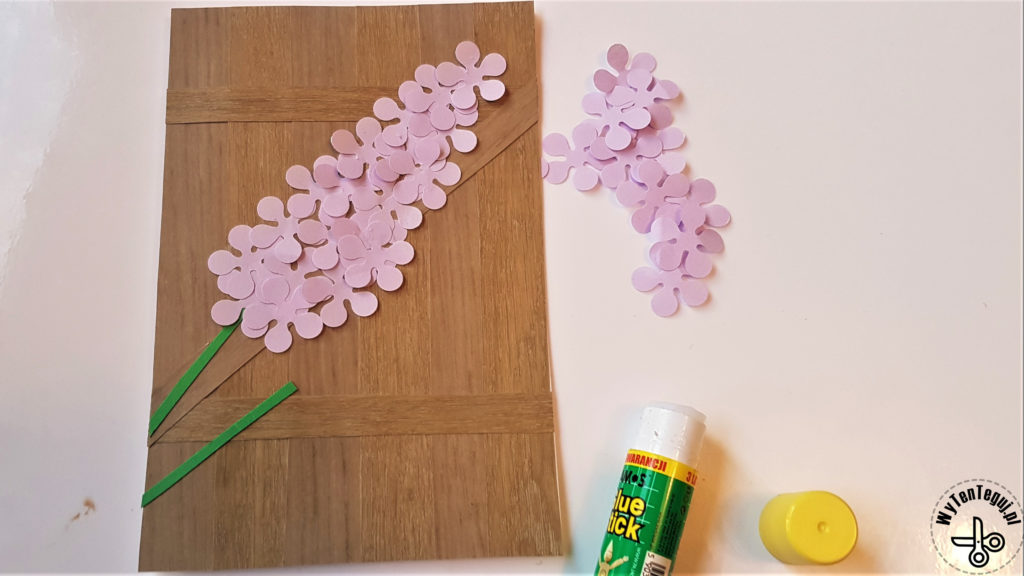 Gluing the lilac flower petals