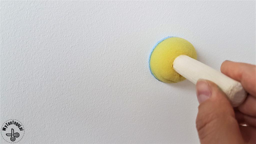 Painting dots on a wall