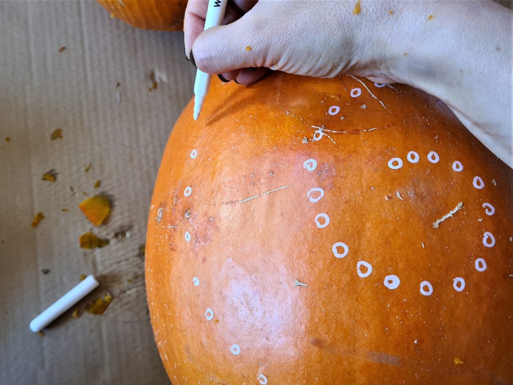 Sketching the selected pattern to the pumpkin