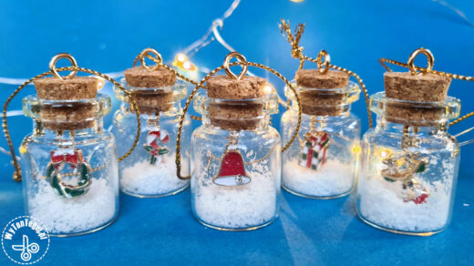 Tiny bottles with Christmas pendants