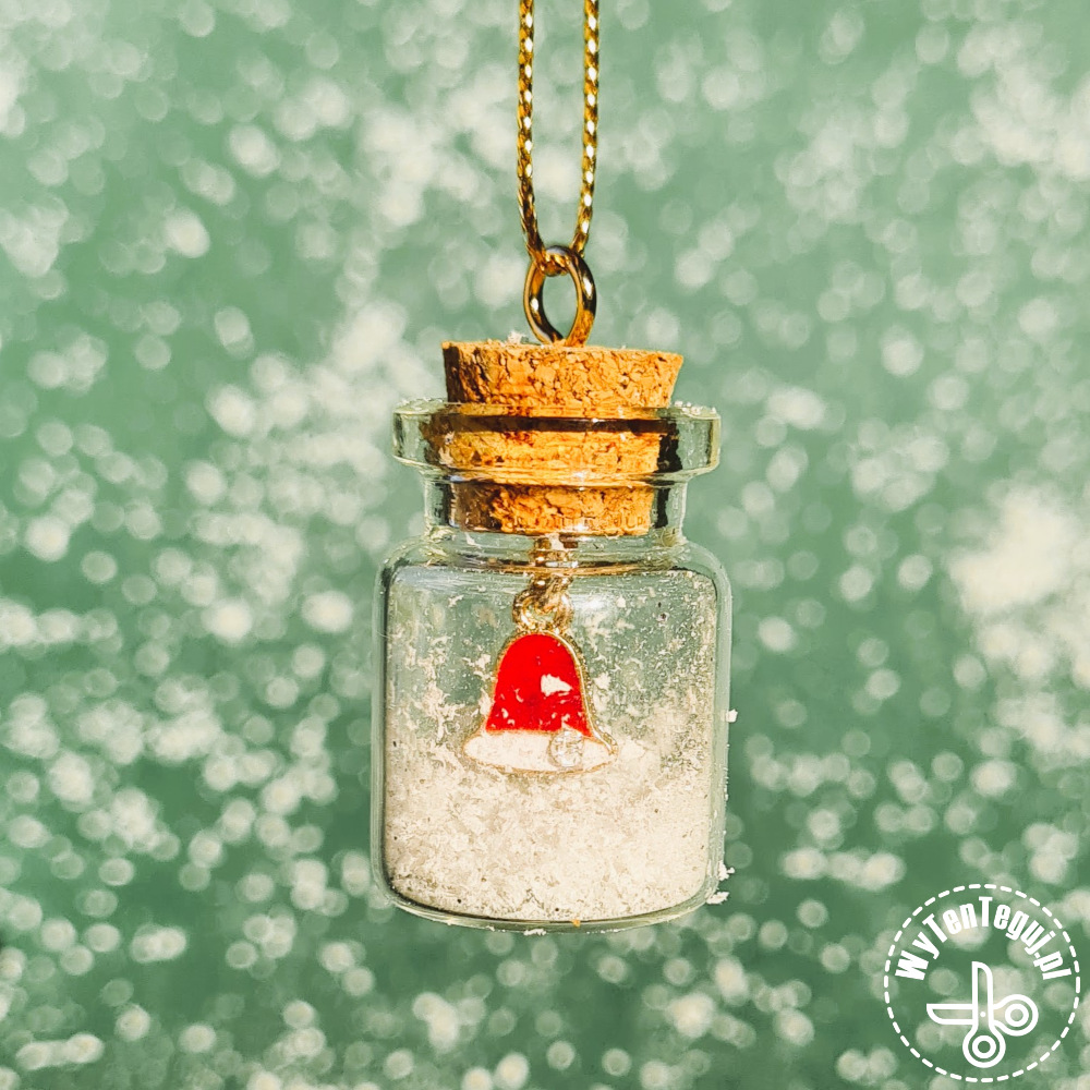 Tiny bottle with Christmas bell