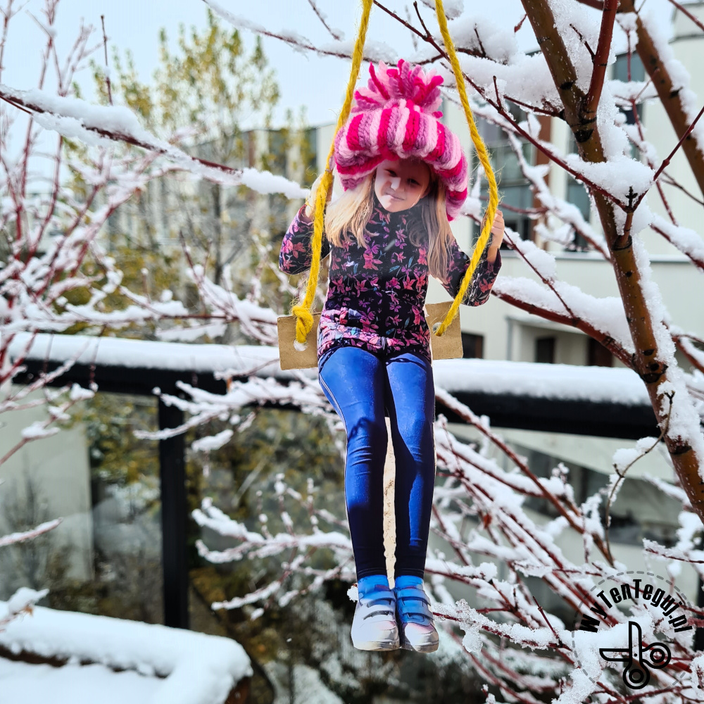 Winter tree with photo swings and mini yarn hats
